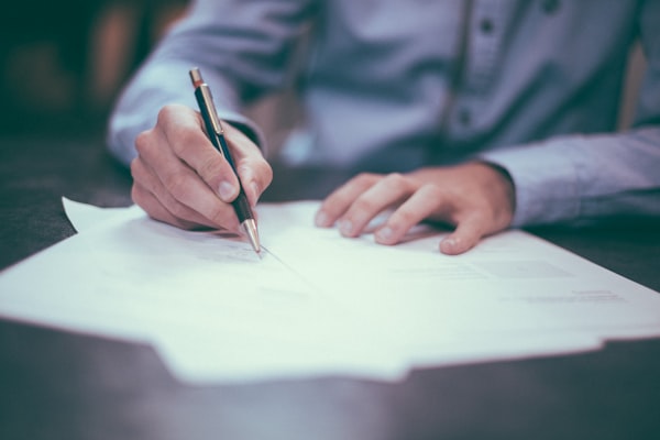 Man filling out form